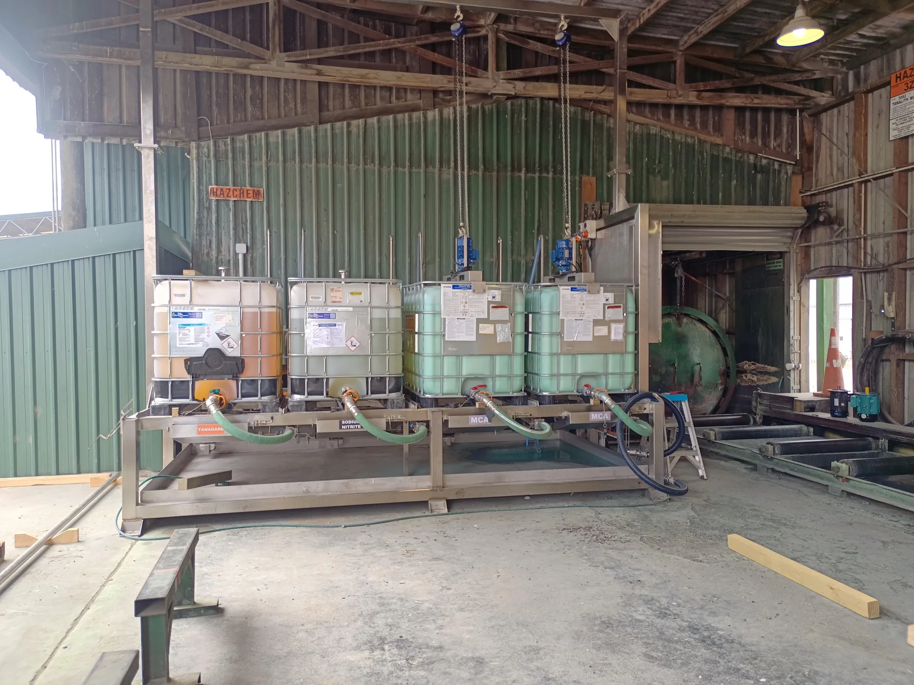 Chemical batching and dosing system for a timber treatment plant